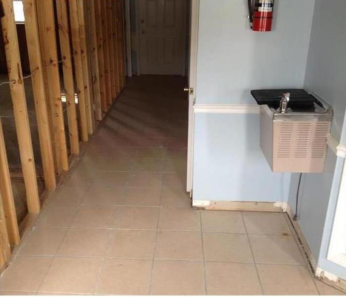 Clean tile floor with the wall framework showing
