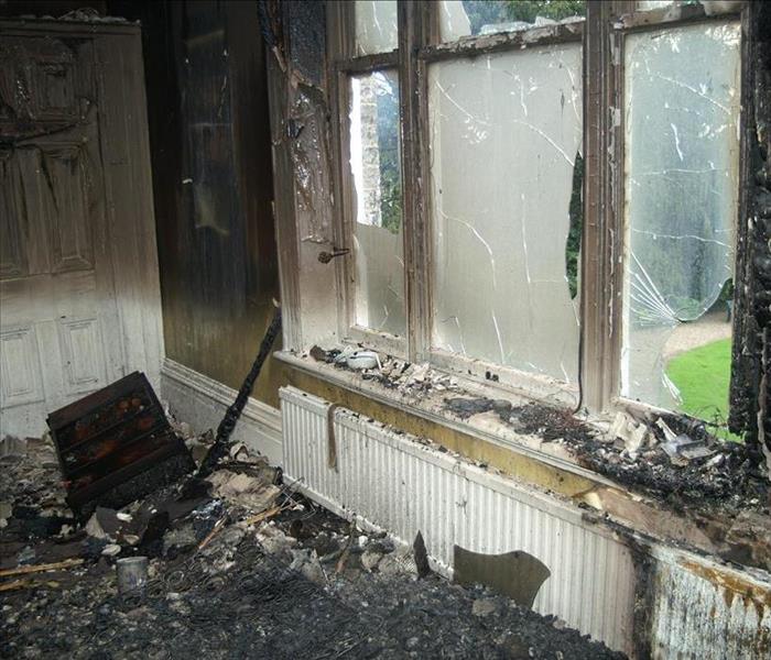 picture of a room burnt down by fire